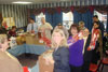 Millersville Business Association stuffing stockings to give to the children who come to see Santa at the Christmas tree lighting